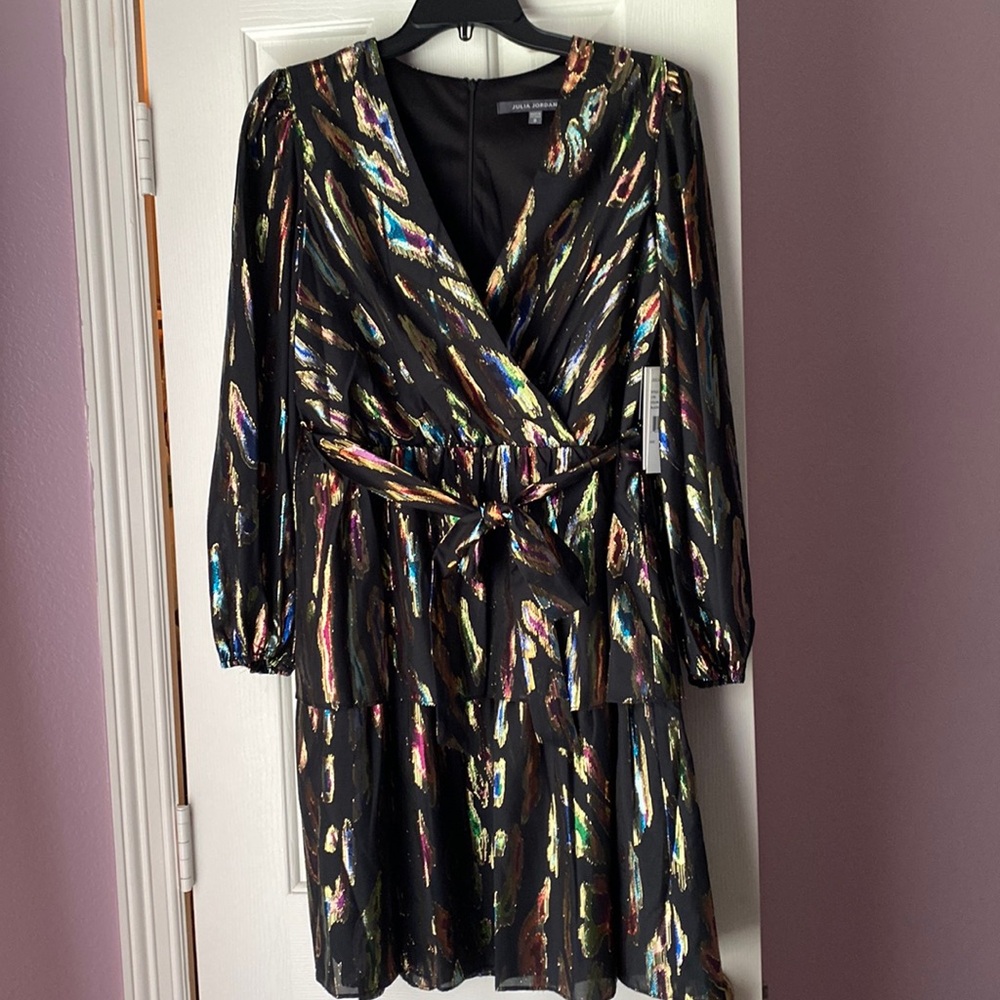 Never been worn with tags Julia Jordan dress in size 8.